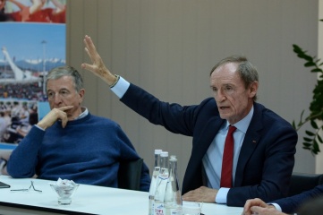 Jean-Claude Killy, flanked by Gilbert Felli, answers questions from RIOU students.