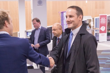 Host City and Cavendish Group CEO Matthew Astill (left) congratulating David Grevemberg CBE at Host City 2015