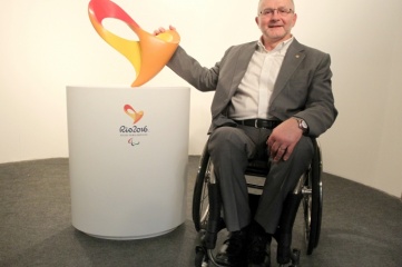 Sir Philip Craven, IPC President, with the Rio 2016 Paralympic Games emblem (Photo: Rio 2016)