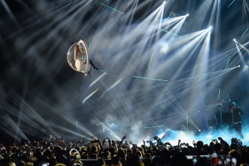 Ariana Grande flying high during the MTV EMAs at Glasgow's SSE Hydro arena in November 2014