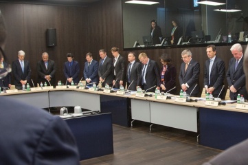 The IOC Executive Board and ANOC Executive Council sharing a minute's silence for Nelson Mandela in December 2013