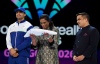 Dr. P. T. Usha, President of the IOA, Gujarat's Hon'ble Deputy Chief Minister Harsh Sanghavi and Neeraj Chopra of Team India accept the Commonwealth Sport flag during the Closing Ceremony